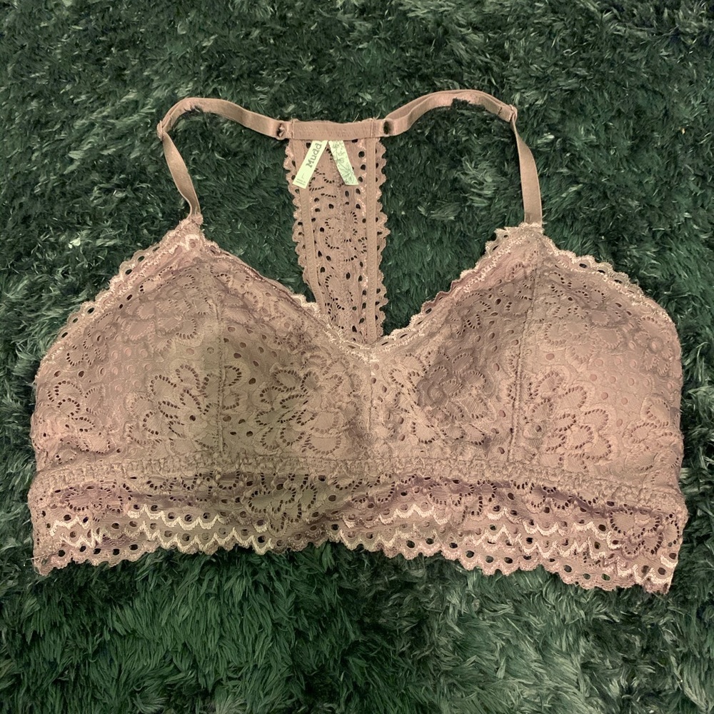 in good condition. It’s a purple bra with a t back